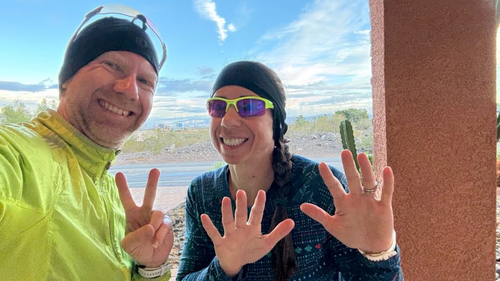 Nathan Whittacre and Joyce Forier smiling during a break in the 4x4x48 challenge, showcasing unity and endurance.